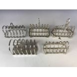 Five electroplate hotel ware toast racks