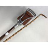 A Game Bird brand shooting stick together with an antique antler-handled bamboo walking cane