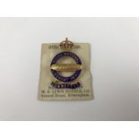 A pre 1952 Royal National Lifeboat Institute committee members lapel badge