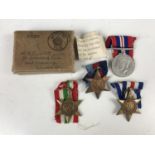 A Second World War Campaign medal group to F C Stott, Royal Navy, in issue carton