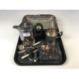 An electroplate basket together with a water jug and toast rack etc