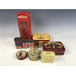 Various advertising tins together with a telephone money box