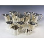 Ten electroplate hotel ware tea and coffee pots etc