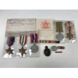 A Second World War Royal Signals campaign medal group including Record of Service and plastic cap