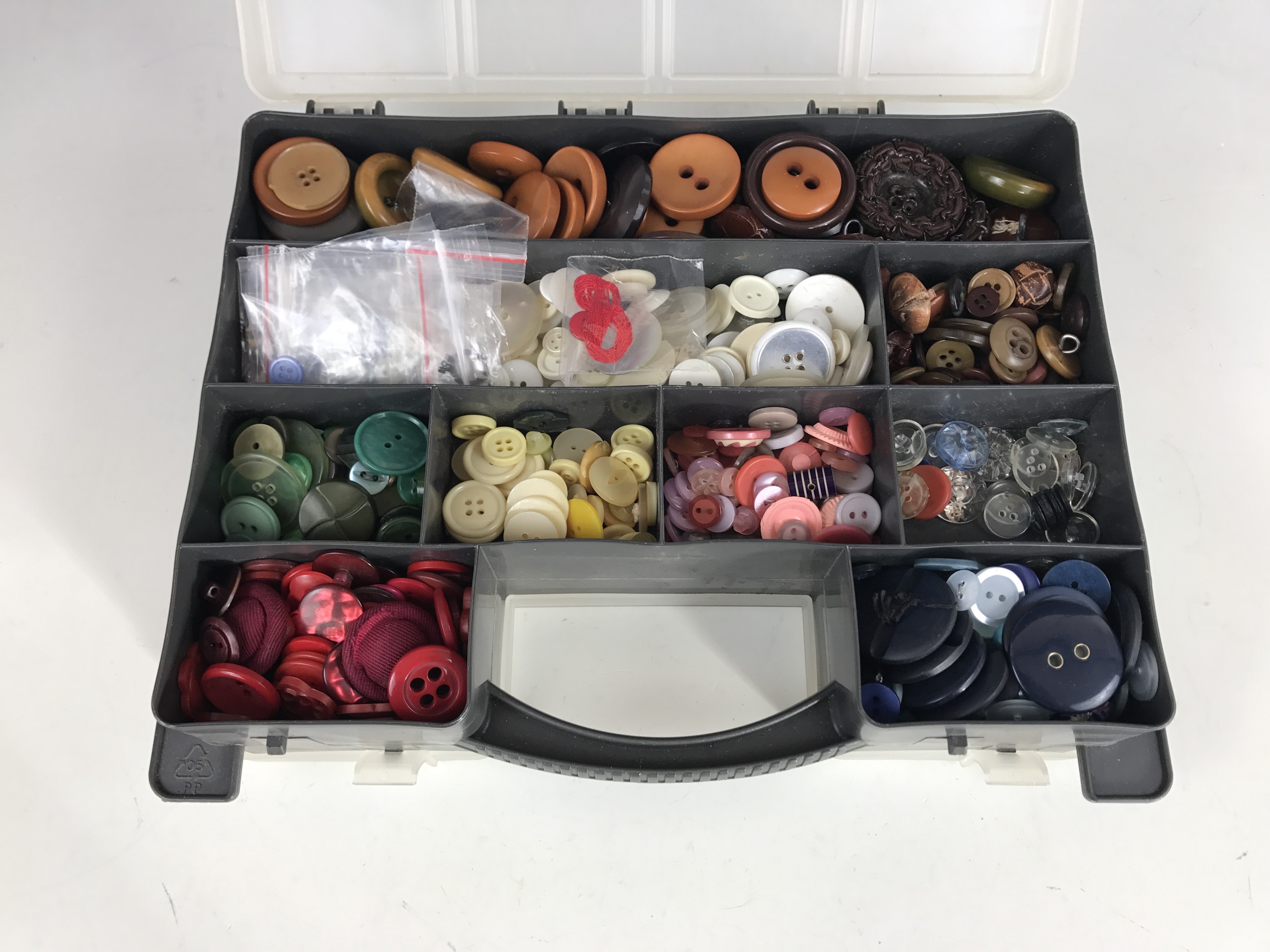 A large quantity of Victorian cut steel style modern 'buttons' for crafting, together with a plastic - Image 2 of 2