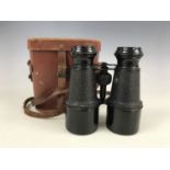 A cased pair of French field glasses