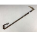 A bone handled riding crop