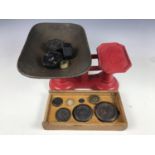 A set of kitchen scales with weights