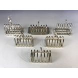 Six electroplate hotel ware toast racks