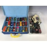 A Matchbox Superfast collector's carrying case with cars together with various model cars