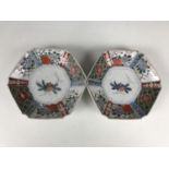 A pair of Chinese small hexagonal dishes decorated in the Famille Vert palette