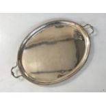 A George V silver two-handled oval tray, decorated with gadrooned edge mouldings, Carrington & Co,