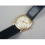 A 1950s Tudor 9ct wrist watch, having radially engine turned circular face with gilt quarter-