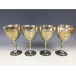 A set of four Edwardian electroplate prize goblets / cups presented at the Edinburgh and