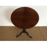 A George III mahogany snap-top tripod tea table, 81 cm high