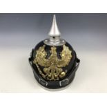 An Imperial German Model 1915 other ranks' pickelhaube bearing Prussian state wappen, the inner rear