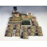 A large collection of Merit OO Gauge and HO Gauge model railway accessories, including Coal