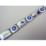 A Norwegian basse-taille enamelled silver panel bracelet designed by David Andersen, in an