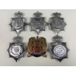 Six post 1952 Police helmet plates