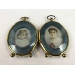 A pair of early 20th Century uniformly presented head and shoulders portrait miniatures of a young
