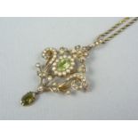 A Belle Epoch peridot and seed pearl transformable pendant necklace, in an openwork scrolling
