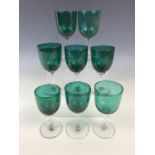 Eight Victorian wine glasses with emerald bowls, 13 cm high