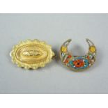 A Victorian Etruscan Revival 15ct gold sentimental locket brooch, bearing moulded decoration and a