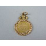 A 9ct school prize fob medallion, 'Replica of the George Maxwell Dux Medal of Langholm Academy / Won