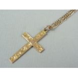 A vintage yellow metal cruciform pendant necklace on a yellow metal neck chain, both stamped '