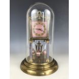 A 1920s guilloche enamelled Jahresuhrenfabrik torsion clock, having a square face with pink