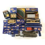 A large collection of boxed Hornby Dublo electric OO Gauge railway platform accessories and track,