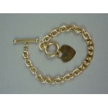 A contemporary 9ct gold belcher link bracelet, having bar-and-ring clasp and heart shaped fob, 7.2