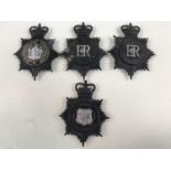 Four post 1952 Police helmet plates