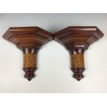 A pair of late 19th Century mahogany bracket wall shelves, with satinwood string and foliate