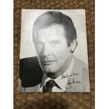 [Autographs / James Bond / Roger Moore] Signed black and white studio photograph [From a
