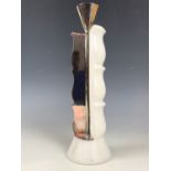 A contemporary Ravissant white metal and alabaster pricket candle stick, of minimalist sectional