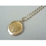 A Queen Elizabeth II 2000 gold half sovereign, in a 9ct gold pendant mount, on a 9ct gold figaro