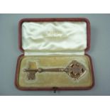 An Edwardian 9ct gold cased presentation key, engraved 'W. G. Roberts Architect, Presented by the