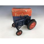 A Chad Valley Co Ltd Working Scale Model of the New Fordson Major tractor, in navy blue with red