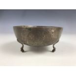 An early 20th Century Greek white metal bowl, bearing engraved depictions of a double-headed