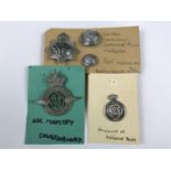 A 1940s Air Ministry Constabulary cap badge, a post 1952 MOD police badge and a group of buttons and