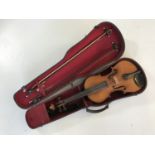 [Violin / viola] An early 20th Century viola, of finely figured timber and having rosewood pegs, the