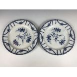 A pair of 18th Century blue and white pearlware plates, 25 cm diameter, one (a/f)