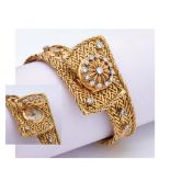 Star gold and diamonds wristwatch