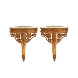Carved and gilt wood Louis XV style corner consoles
