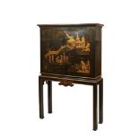 Oriental lacquered and gilt wood cabinet