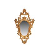 Carved and gilt wood mirror