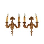 Carved and gilt Lous XVI style wall lamps