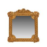 Carved and gilt wood mirror