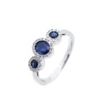 White gold, blue sapphires and diamonds ring